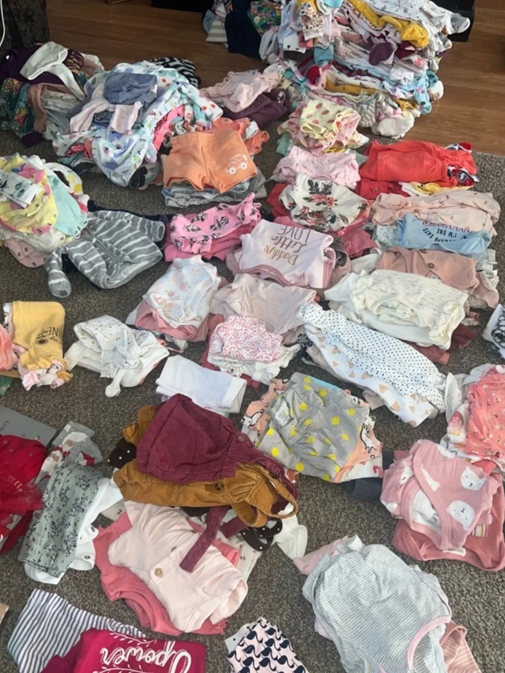 Tote of baby girls clothing